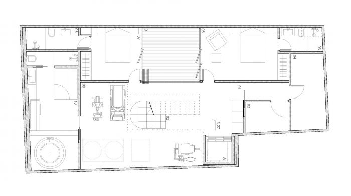 Plano de la planta sótano con los dormitorios, los baños y la zona de gimnasio